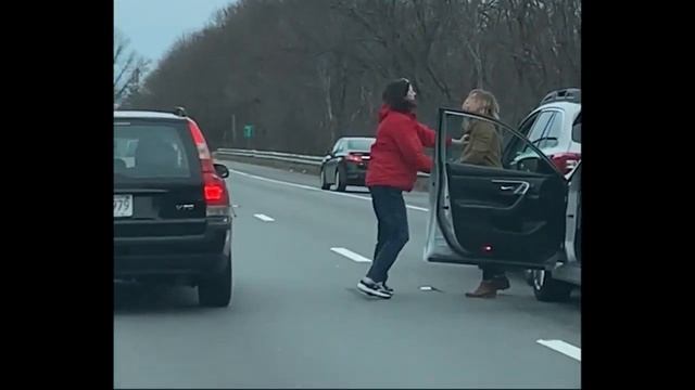 Two women fist-fighting on Massachusetts highway caught on camera