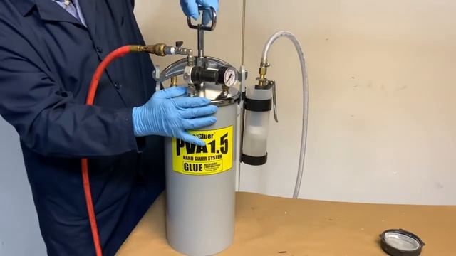 Filling  and priming Cold Glue Pressure Vessel Hand Gluer system with water based glue