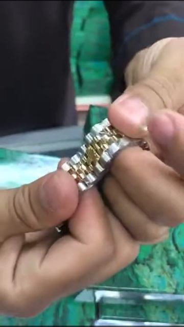 How to open rolex watch
