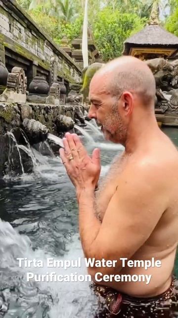 We had to wear a sarong and perform a ritual under 13 water spouts. Tirta Empul Water Temple.