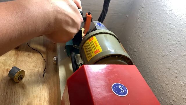 [4] Copying a key with that super cheap key copying machine on amazon.