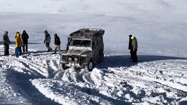 Land Rover Defender in deep snow. 4x4 Adventures. Kazakhstan. Mountains. The roads. Ущелье Кастек.