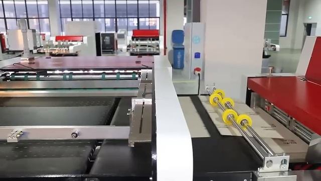 Автоматическая машина для резки картона SLF-1300S (с серво приводными ножами и автоподачей Feida)