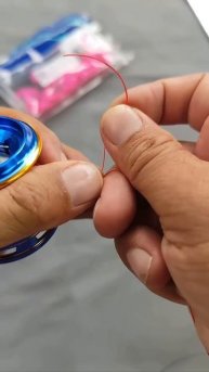 Как привязать шнур к шпуле?