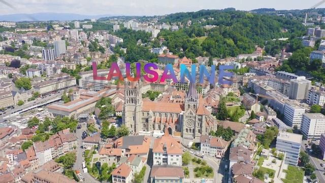 Inscription on video. Lausanne, Switzerland. Cathedral of Lausanne. La Cite is a district historica