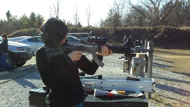 Woman with rifle 1.MOV