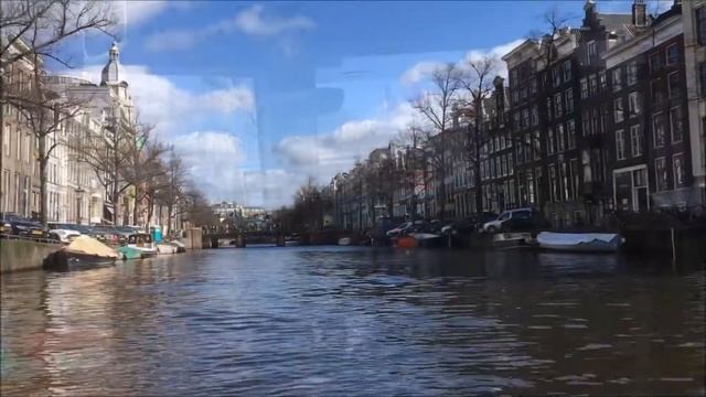 Amsterdam: Canals, Rembrandt, Boats and an East Indiaman