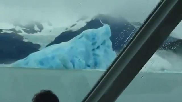 Iceberg flips over, RARE!