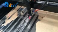 Dekcel co2 cnc laser machine cutting acrylic