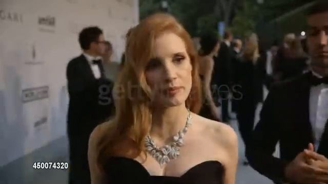 Jessica Chastain Interviewed at the amfAR Gala in Cannes (May 22, 2014)