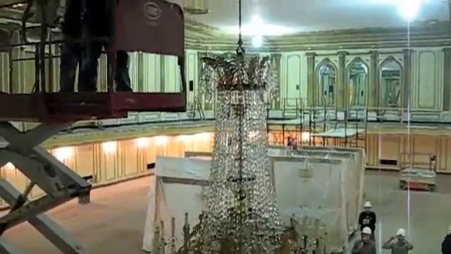 Raising of the Crystal Chandeliers in the Grand Ballroom of the Palmer House