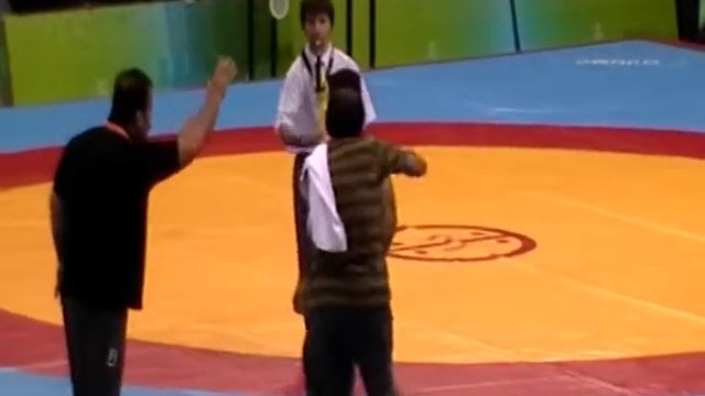 Deaflympic Wrestling: Freestyle- Tsoktoev, RUS (blue) vs Derikvand, IRI for 66kg