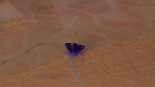 Tanzanite Round .57 Carat Violet Blue Exceptional