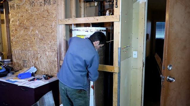 Hot water heater insulating jacket:  How much savings