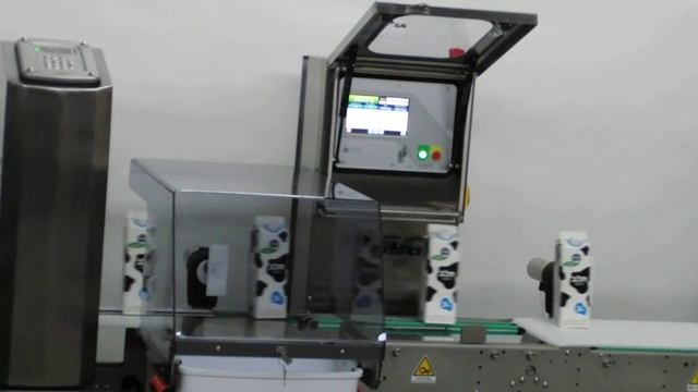 Чеквейер для контроля веса в потоке для линии пакетированного молока. Checkweigher Nemesis