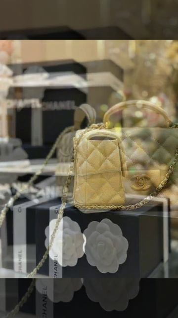 Chanel Mini Flap Bag With Top Handle: A Captivating Symphony of Elegance