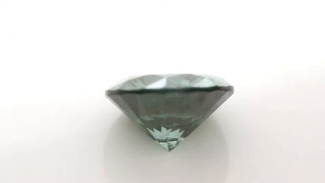 0.06 carat Deep Forest Green Color Good I-1 Clarity Round Brilliant Diamond