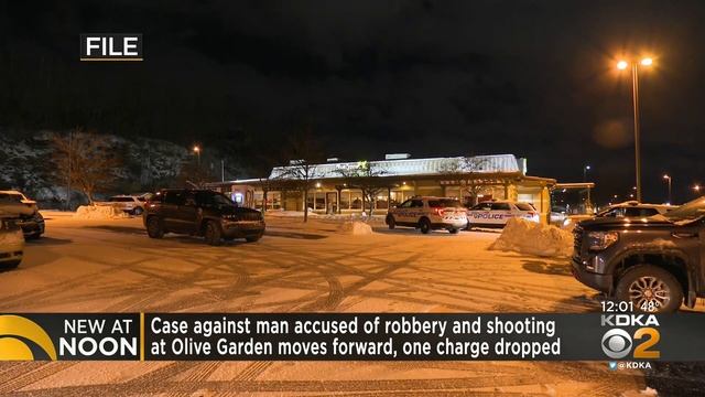 Case against man accused in robbery and shooting at Olive Garden moves forward with 1 charge droppe