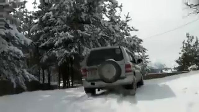 pajero io in dry snow.mp4