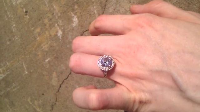 2 carat white sapphire with white sapphire halo.