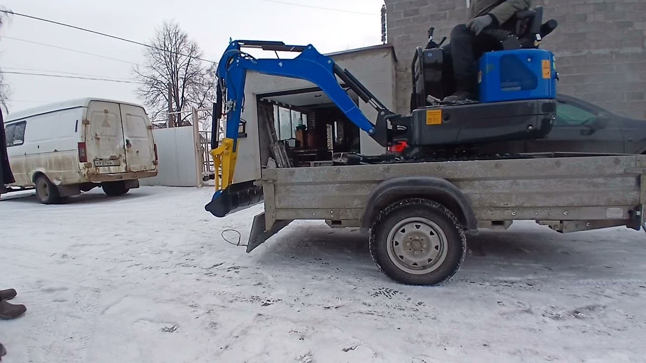 съезд мини экскаватора с прицепа