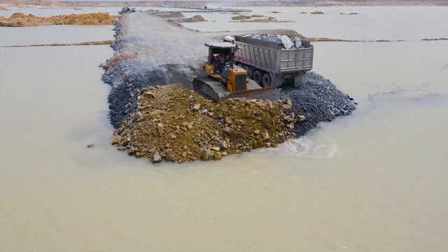 Строительство, дорога через озеро, очередной обзор