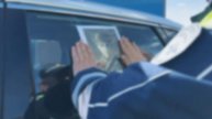 Служебные автомобили госавтоинспекторов украшают портреты участников Великой Отечественной войны