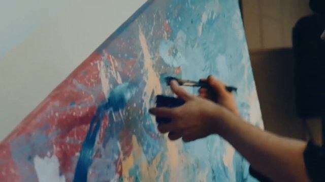 Портрет юного именинника, который нарисовал художник Алексей Апиш вращая холст на глазах у зрителей