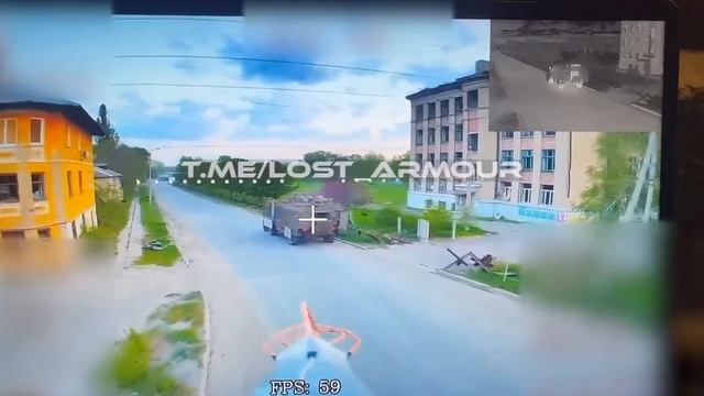 Российский дрон красиво залетает в десантное отделение украинского MRAP в Константиновке.