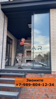 Безрамное раздвижное остекление от LLYMAR