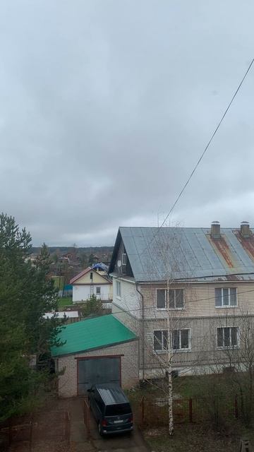 The weather outside the window in our village: пасмурная погода