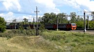 Электропоезд ЭД9Э-0057 и облако-наковальня.
