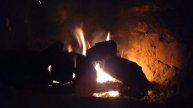 Деревяшки горят в Печи Обогрева 15-ого Декабря, поверх ?