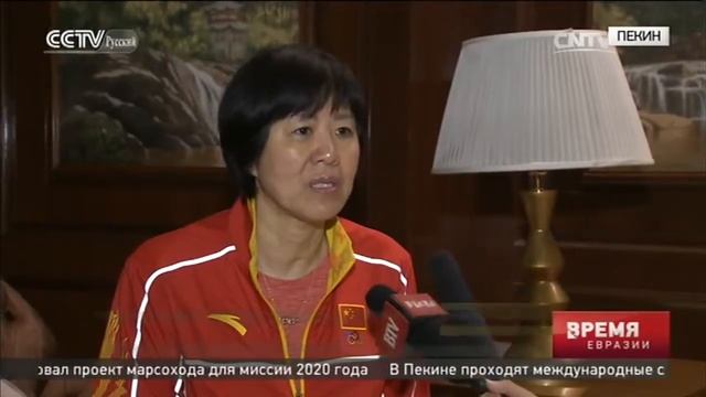 Китайских олимпийцев в международном аэропорту Пекина болельщики встретили овациями