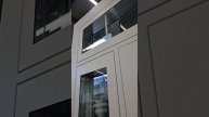 Нестандартная металлическая дверь со стеклопакетом под заказ от производителя для коттеджа. Доставка