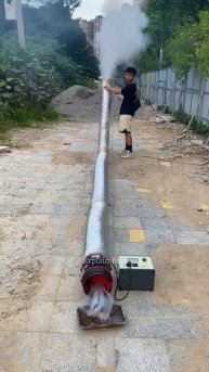 Boy Blows Massive Smoke from Pipe #shortsvideo
