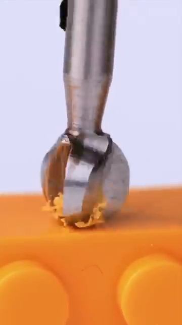 Close-up of drilling toy block with slow motion #asmr