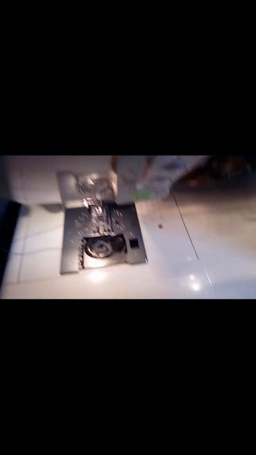 Кошка и швейная машина