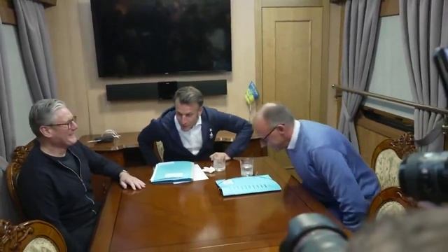 A bag of white powder on the table. Macron quickly pockets it, Merz hides the spoon. ++