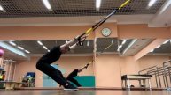 TRX – Разгибание спины с руками над головой / TRX Overhead Back E