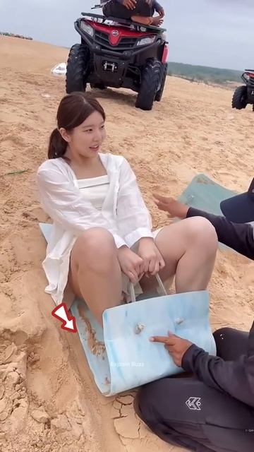 Girl slid on sand using a mat #shortsvideo