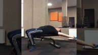 252. Опускание прямых рук за голову с бодибаром