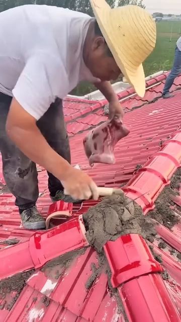 The process of installing red roof tiles #shorts