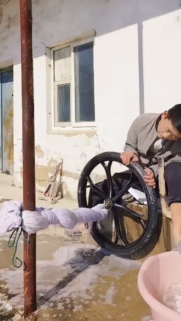 Wringing clothes using vehicle wheels #shorts