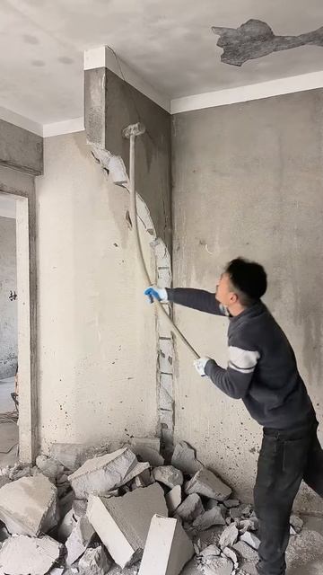 The process of destroying walls easily using a hammer #shorts