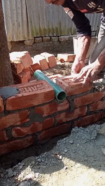 The process of installing pipes on the walls of the house #shorts