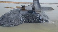 Строительство, дорога на озере, засыпка очередной обзор