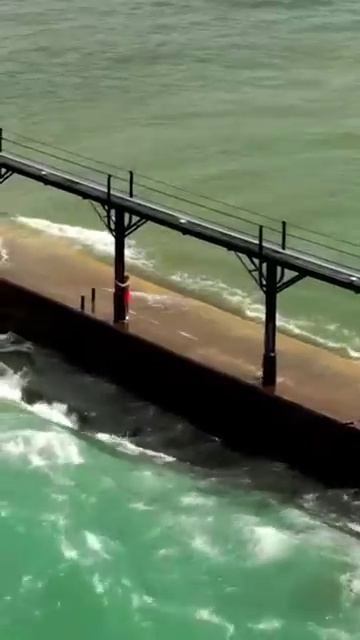 Kids Almost Swept Off Lighthouse Pier #nature #waitforit #waves #ocean