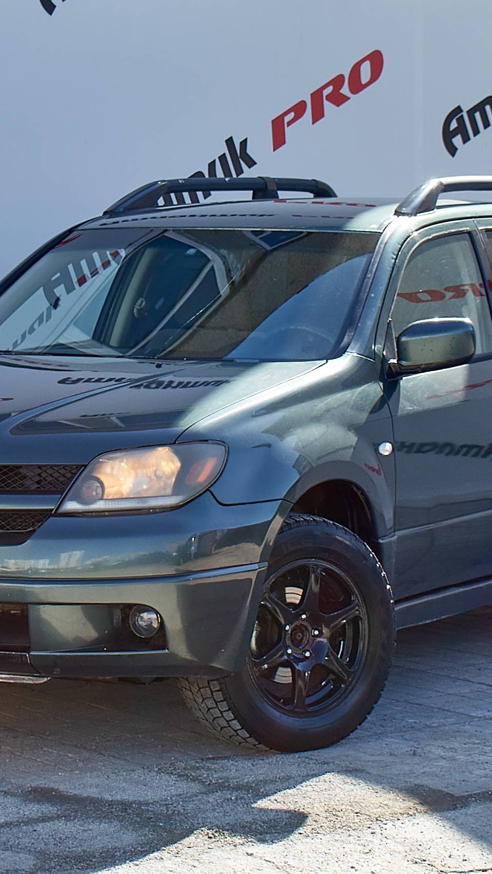 Обзор на Mitsubishi Outlander Кроссовер 2.4 AT 4WD 2002г