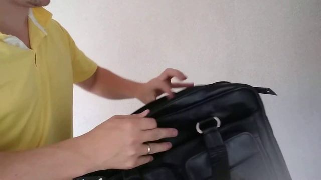 Дорожные кожаные сумки